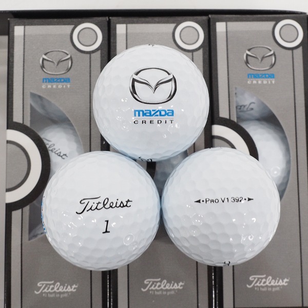実際に弊社で買取させて頂いた【未使用/オウンネーム】Titleist/タイトリスト MAZDA/マツダ PRO V1 392 ゴルフボール ホワイト 1ダースの画像 1枚目