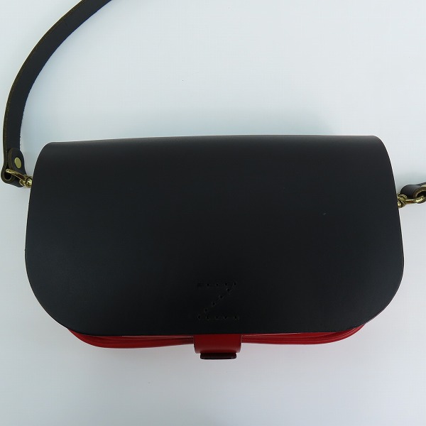 実際に弊社で買取させて頂いたHERZ/ヘルツ 50周年/50th記念 レザー ショルダーバッグ ブラック×レッド