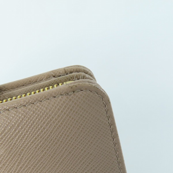 実際に弊社で買取させて頂いたPRADA/プラダ サフィアーノ コンパクトウォレット/二つ折り財布の画像 9枚目