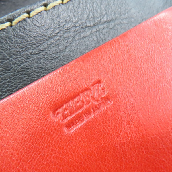 実際に弊社で買取させて頂いたHERZ/ヘルツ レザー 二つ折り財布 レッドの画像 4枚目