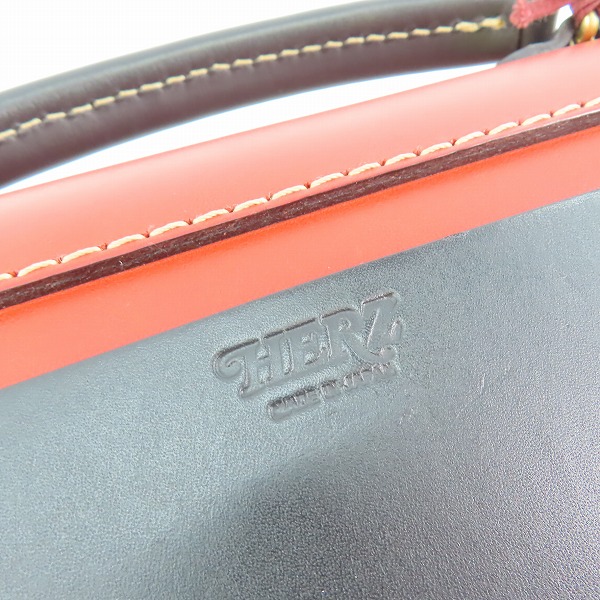 実際に弊社で買取させて頂いたHERZ/ヘルツ プリンショルダー 2way ショルダーバッグ/ハンドバッグ レッド×ブラックの画像 4枚目