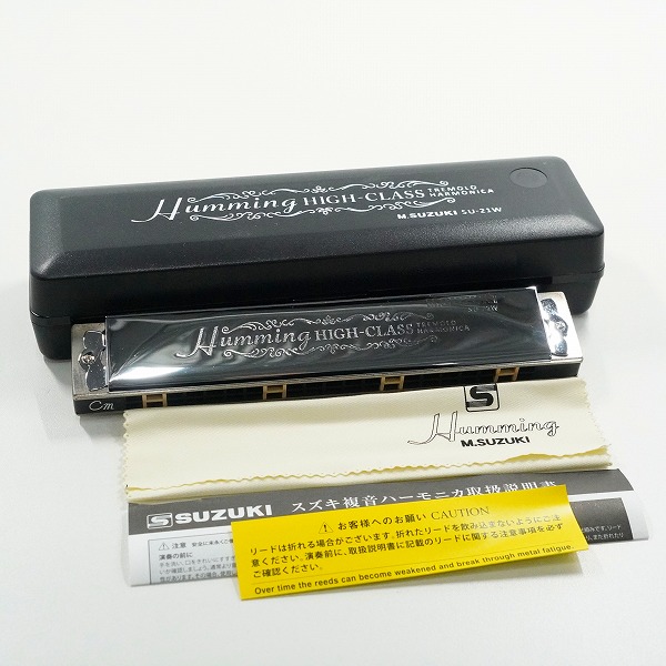 実際に弊社で買取させて頂いたM.SUZUKI/スズキ SU-21W Humming 高級ハミング 21穴 複音ハーモニカ Cm調 ハーモニカ ケース付きの画像 0枚目