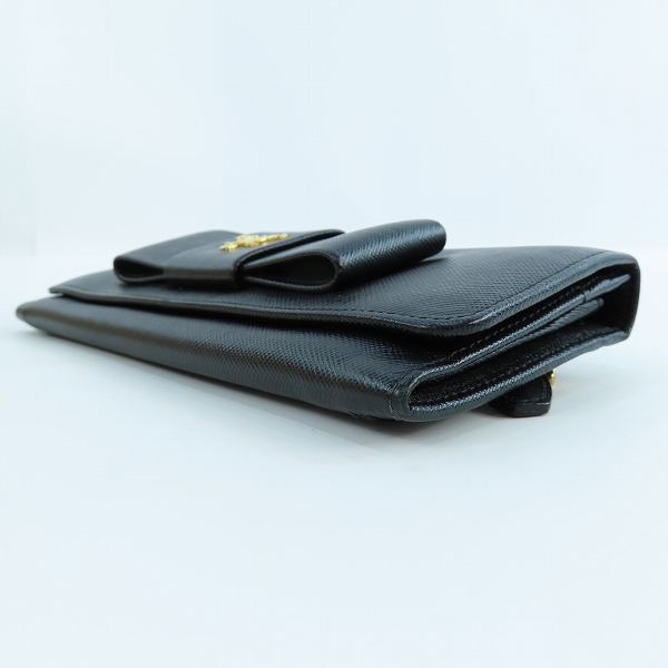 実際に弊社で買取させて頂いたPRADA/プラダ リボン サフィアーノレザー二つ折り長財布 1M1132の画像 2枚目