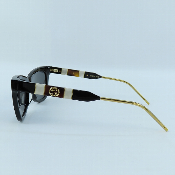 実際に弊社で買取させて頂いたGUCCI/グッチ インターロッキングG サングラス/アイウェア GG0598S 001の画像 1枚目