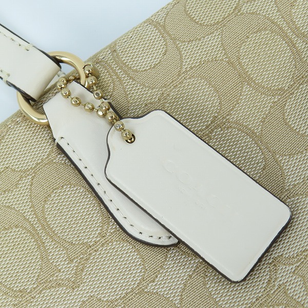 実際に弊社で買取させて頂いたCOACH/コーチ シグネチャー ロゴ 総柄 トートバッグ/CG977の画像 4枚目