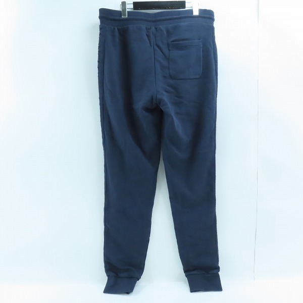 実際に弊社で買取させて頂いた【JPタグ】MONCLER/モンクレール PANTALONE サイドロゴ スウェットパンツ ネイビー F10918H71260/L の画像 1枚目