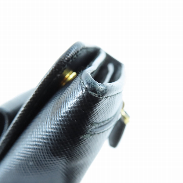 実際に弊社で買取させて頂いたPRADA/プラダ リボン サフィアーノレザー二つ折り長財布 1M1132の画像 9枚目