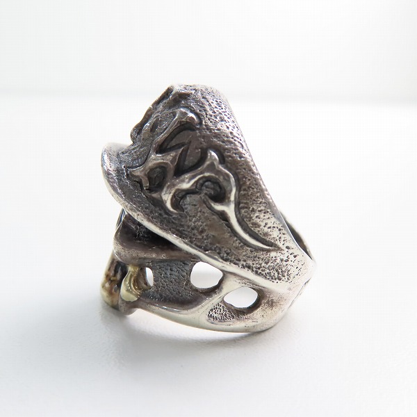 実際に弊社で買取させて頂いた【ギャラ付】トラヴィスワーカー FTW2013 ブラックヘルメット スカル リング w/ストーンアイズ ゴールドドリズラー 20.5-22号の画像 2枚目