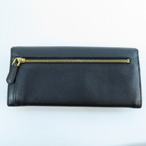 実際に弊社で買取させて頂いたPRADA/プラダ リボン サフィアーノレザー二つ折り長財布 1M1132の画像 1枚目