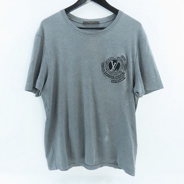 実際に弊社で買取させて頂いたLOUIS VUITTON/ルイヴィトン VOYAGE 都市 サークルワッペンロゴ Tシャツ RM162 CMS HAY85W/XL