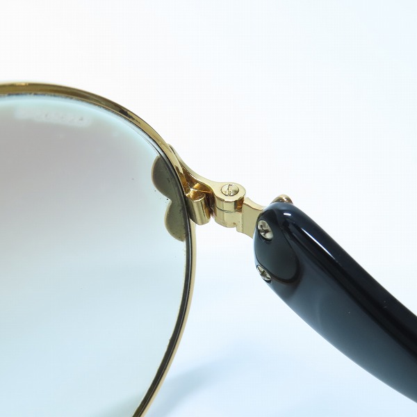 実際に弊社で買取させて頂いたPRADA/プラダ ラウンド型/ウェーブテンプル サングラス SPR55T の画像 4枚目