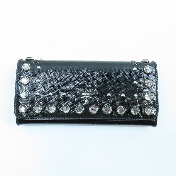 実際に弊社で買取させて頂いたPRADA/プラダ  スタッズ 二つ折り ロング ウォレット 1M1132