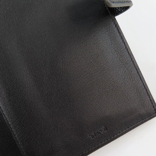 実際に弊社で買取させて頂いたTUMI/トゥミ travel wallet w zip pouch トラベルウォレット/二つ折り長財布の画像 7枚目