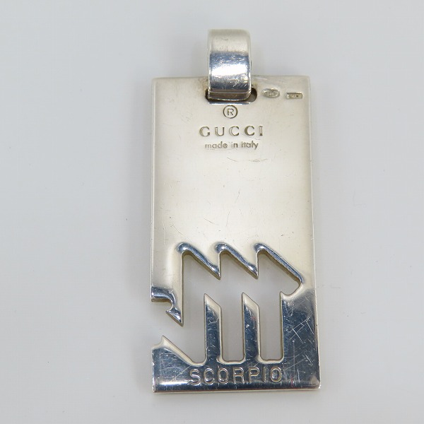 実際に弊社で買取させて頂いたGUCCI/グッチ ホロスコープペンダントトップ SCORPIO/さそり座 紐付きの画像 2枚目