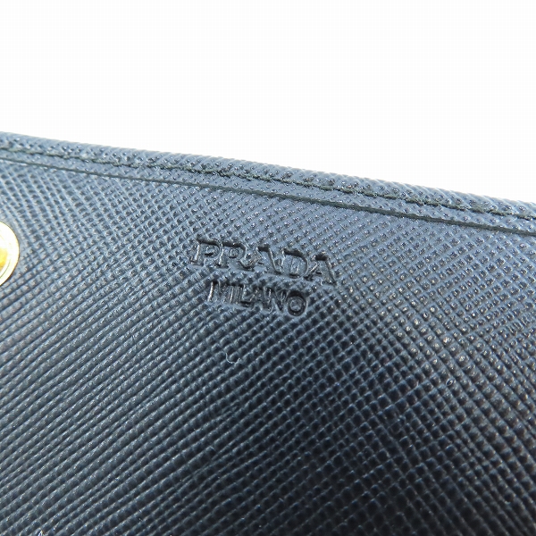 実際に弊社で買取させて頂いたPRADA/プラダ リボン サフィアーノレザー二つ折り長財布 1M1132の画像 7枚目