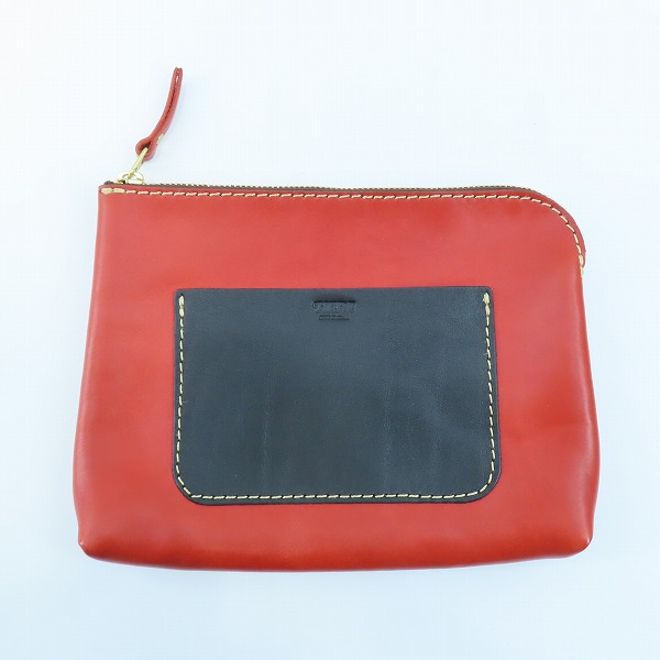 実際に弊社で買取させて頂いたHERZ/ヘルツ レザー マチ付き ポーチ レッド×ブラック