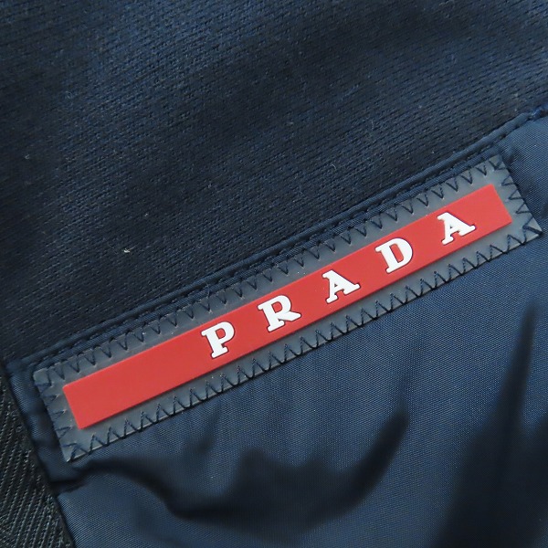 実際に弊社で買取させて頂いた【JPタグ】PRADA/プラダ ナイロン切替 ジップアップ フーディーベスト SJG55/XLの画像 8枚目