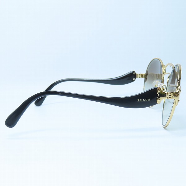 実際に弊社で買取させて頂いたPRADA/プラダ ラウンド型/ウェーブテンプル サングラス SPR55T の画像 1枚目