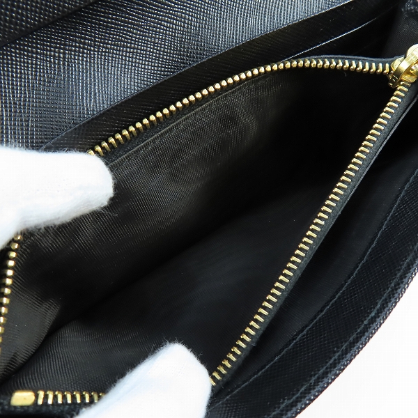 実際に弊社で買取させて頂いたPRADA/プラダ リボン サフィアーノレザー二つ折り長財布 1M1132の画像 5枚目