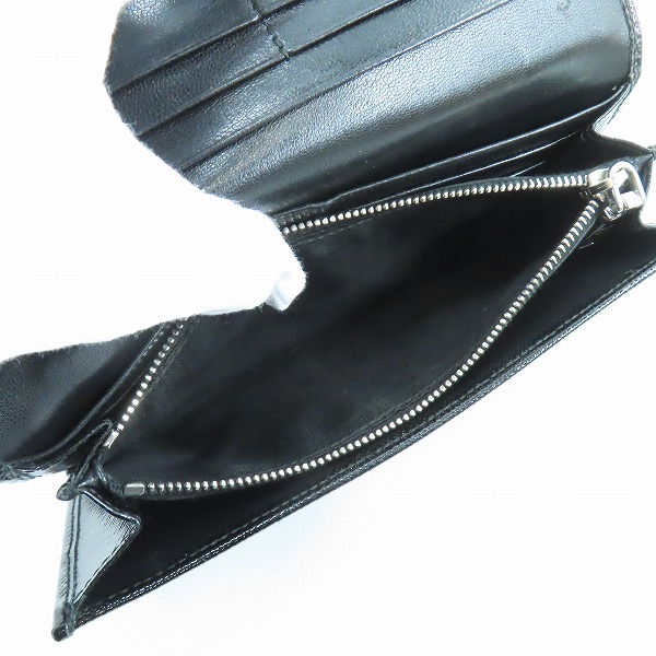 実際に弊社で買取させて頂いたPRADA/プラダ  スタッズ 二つ折り ロング ウォレット 1M1132の画像 4枚目