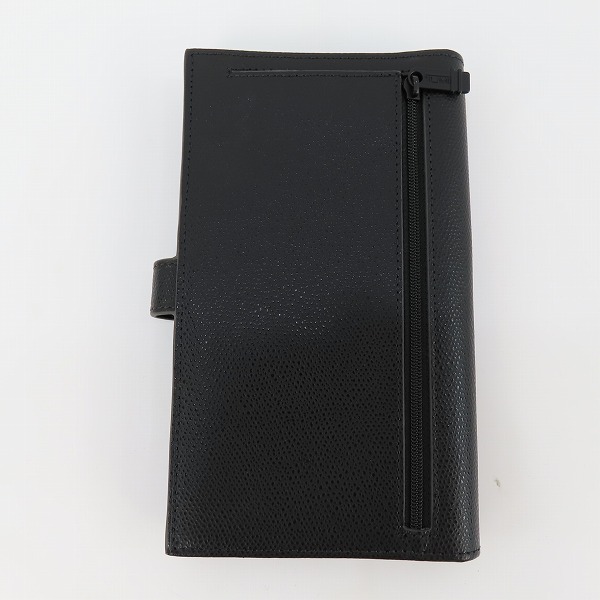 実際に弊社で買取させて頂いたTUMI/トゥミ travel wallet w zip pouch トラベルウォレット/二つ折り長財布の画像 1枚目