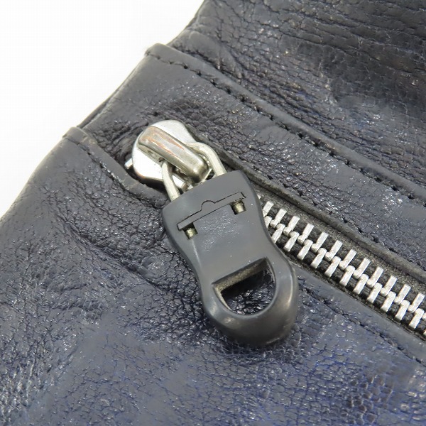 実際に弊社で買取させて頂いたCHROME HEARTS/クロムハーツ WAVE/ウェーブウォレット クロスボタン 財布の画像 8枚目