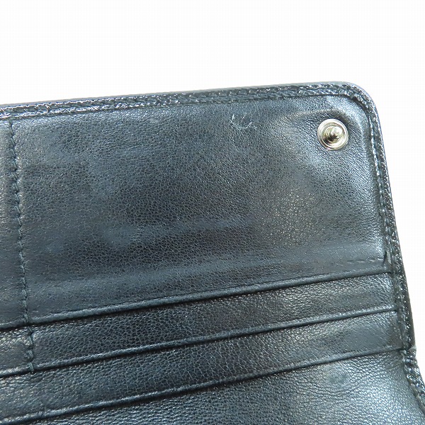 実際に弊社で買取させて頂いたPRADA/プラダ  スタッズ 二つ折り ロング ウォレット 1M1132の画像 6枚目