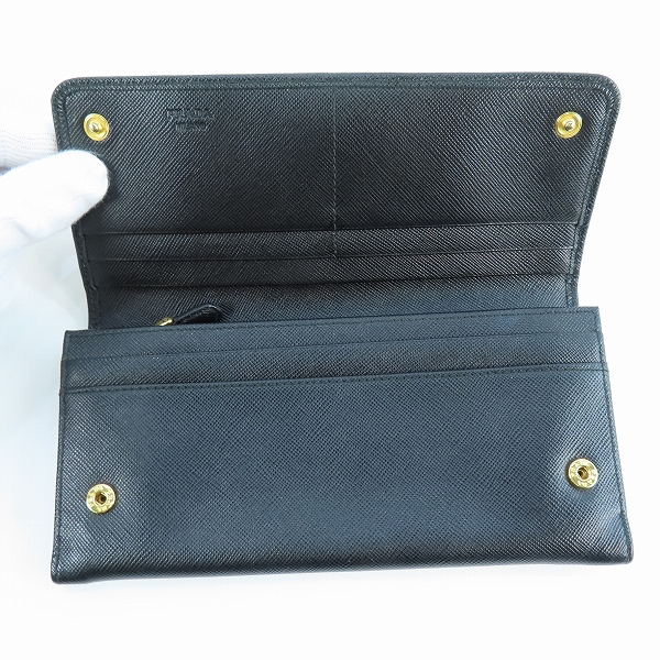 実際に弊社で買取させて頂いたPRADA/プラダ リボン サフィアーノレザー二つ折り長財布 1M1132の画像 3枚目