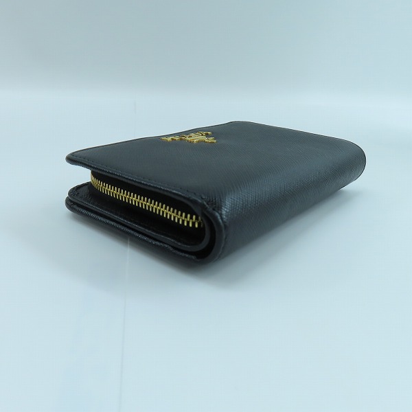 実際に弊社で買取させて頂いたPRADA/プラダ サフィアーノ サフィアーノ トライアングル  ウォレット/二つ折り財布 1ML225の画像 2枚目