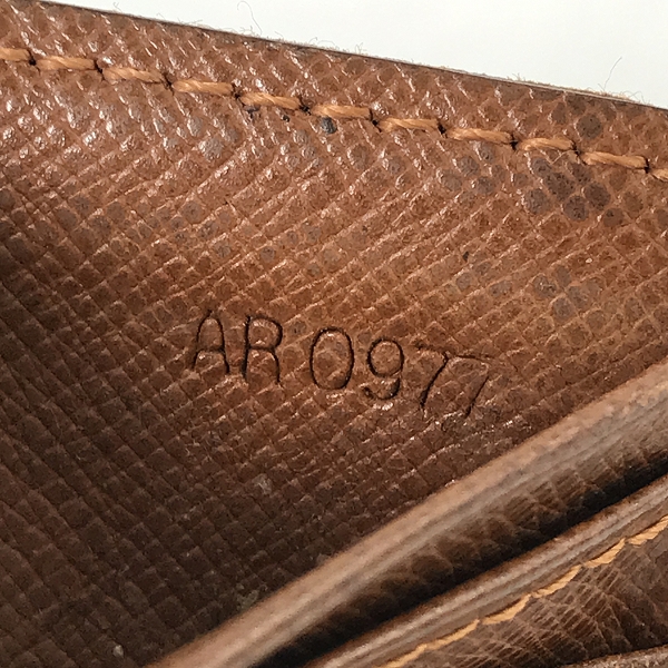 実際に弊社で買取させて頂いたLOUIS VUITTON/ルイヴィトン モノグラム 二つ折り財布/札入れ T7592の画像 5枚目
