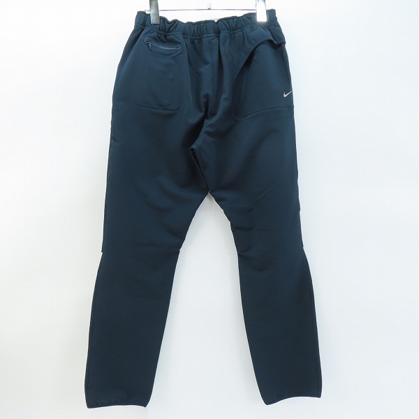 実際に弊社で買取させて頂いたGYAKUSOU UNDERCOVER×NIKE/ギャクソウ アンダーカバー×ナイキ 4-WAY STRETCH SLIM PANT パンツ 658483-400 Lの画像 1枚目