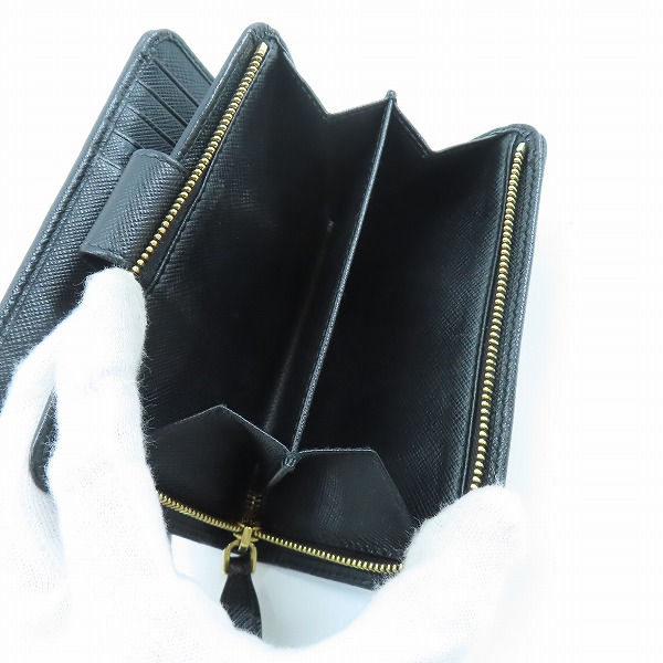 実際に弊社で買取させて頂いたPRADA/プラダ サフィアーノ サフィアーノ トライアングル  ウォレット/二つ折り財布 1ML225の画像 4枚目