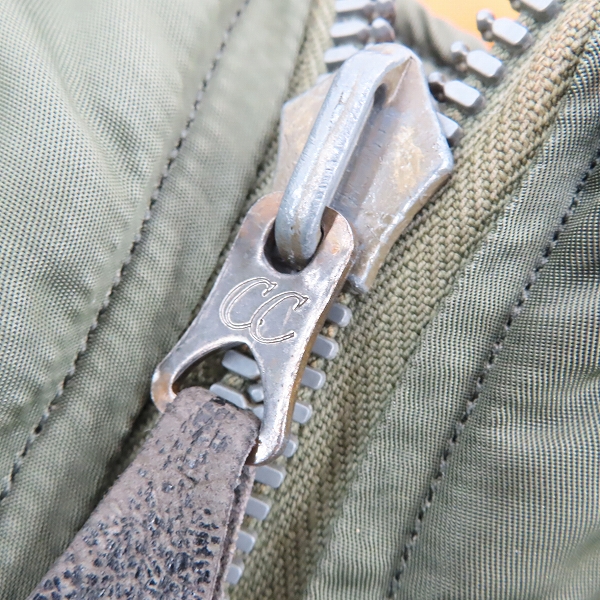 実際に弊社で買取させて頂いたALPHA/アルファ MIL-J-8279D CC刻印ジッパー ヴィンテージ/ビンテージ MA-1 フライトジャケット 1963年製/Mの画像 5枚目