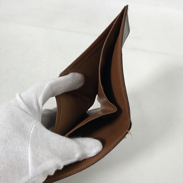 実際に弊社で買取させて頂いたLOUIS VUITTON/ルイヴィトン モノグラム 二つ折り財布/札入れ T7592の画像 6枚目