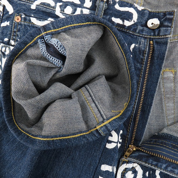 実際に弊社で買取させて頂いたJUNYA WATANABE MAN COMME des GARCON×10・corso・como×LEVI'S ペイント加工 デニム パンツ SS-P201/AD2007/33の画像 2枚目