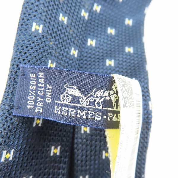 実際に弊社で買取させて頂いたHERMES/エルメス Hロゴ総柄 シルク ネクタイの画像 1枚目