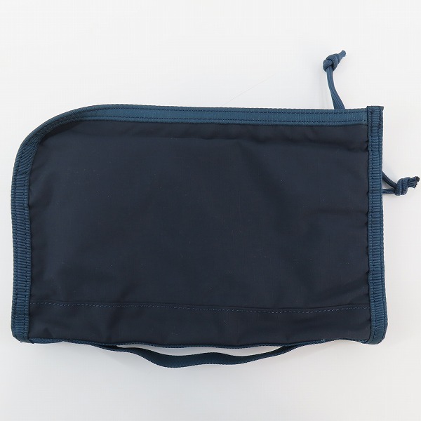実際に弊社で買取させて頂いたBRIEFING/ブリーフィング TRAVEL TAP トラベルタップ クラッチバッグ ネイビーの画像 1枚目