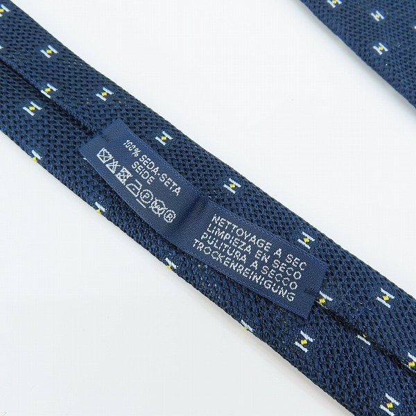 実際に弊社で買取させて頂いたHERMES/エルメス Hロゴ総柄 シルク ネクタイの画像 5枚目