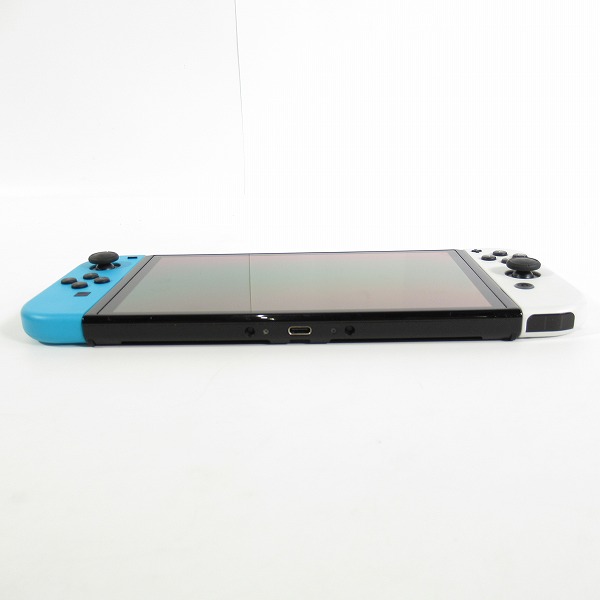 実際に弊社で買取させて頂いた任天堂 Nintendo Switch/ニンテンドースイッチ 有機ELモデル 本体 HEG-001/カービィ フロントカバー/クイックポーチ付きの画像 4枚目