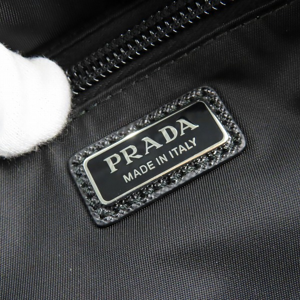 実際に弊社で買取させて頂いたPRADA/プラダ Re-Nylon xサフィアーノレザー トラベルポーチの画像 5枚目