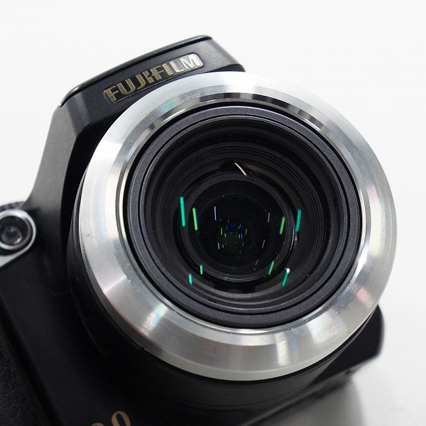実際に弊社で買取させて頂いたFUJIFILM/富士フイルム FINEPIX S8100fd コンパクトデジタルカメラ 単3電池駆動 簡易動作確認済みの画像 1枚目