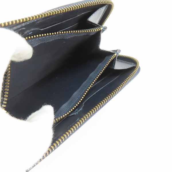 実際に弊社で買取させて頂いたFelisi/フェリージ ラウンドジップ ウォレット クロコ型押し レザー 125の画像 5枚目