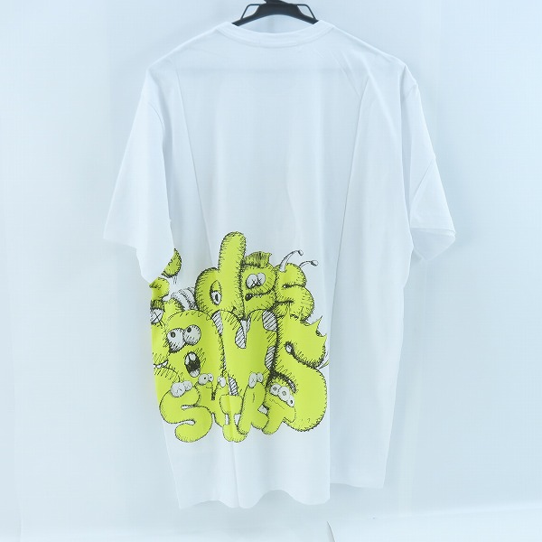 実際に弊社で買取させて頂いたCOMME des GARCONS SHIRT×KAWS/コムデギャルソンシャツ×カウズ マルチデザインプリントTシャツ FH-T005/XLの画像 1枚目