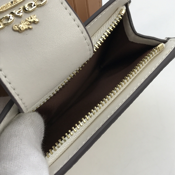 実際に弊社で買取させて頂いたCOACH/コーチ フローラル/花柄 二つ折り財布の画像 4枚目
