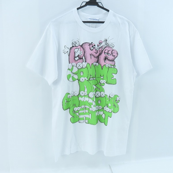 実際に弊社で買取させて頂いたCOMME des GARCONS SHIRT×KAWS/コムデギャルソンシャツ×カウズ ピンク/グリーン プリントTシャツ FH-T004/XL