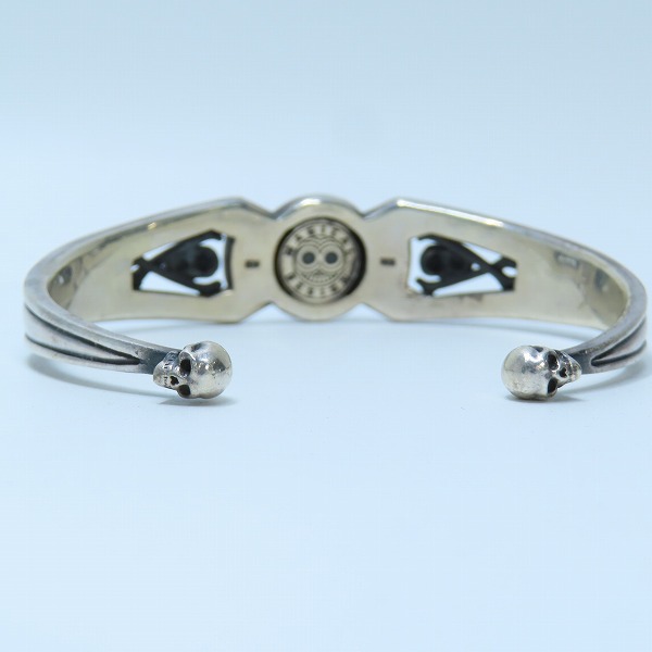 実際に弊社で買取させて頂いたMAGICAL DESIGN/マジカルデザイン チベタン スカル バングル  K18×925の画像 3枚目