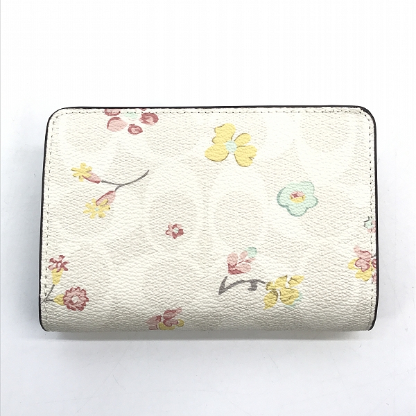 実際に弊社で買取させて頂いたCOACH/コーチ フローラル/花柄 二つ折り財布の画像 1枚目