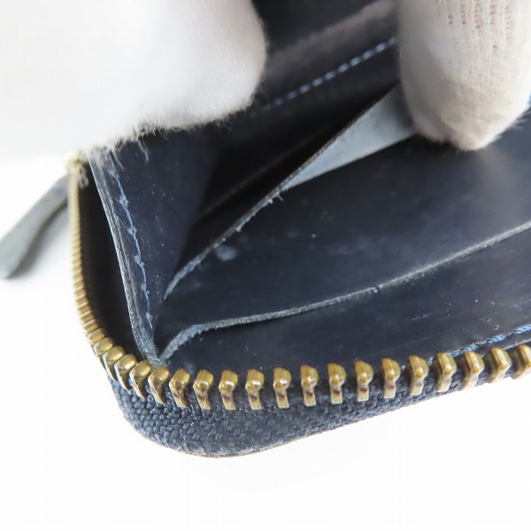 実際に弊社で買取させて頂いたFelisi/フェリージ ラウンドジップ ウォレット クロコ型押し レザー 125の画像 7枚目