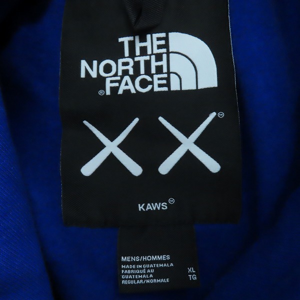 実際に弊社で買取させて頂いた【未使用】THE NORTH FACE × KAWS/ノースフェイス×カウズ プルオーバーパーカー NF0A7WLIVA6/XLの画像 2枚目