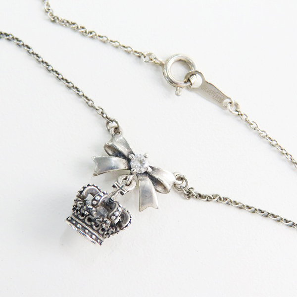 実際に弊社で買取させて頂いたJustin Davis/ジャスティンデイビス PETIT FADEIT リボン クラウン ネックレス